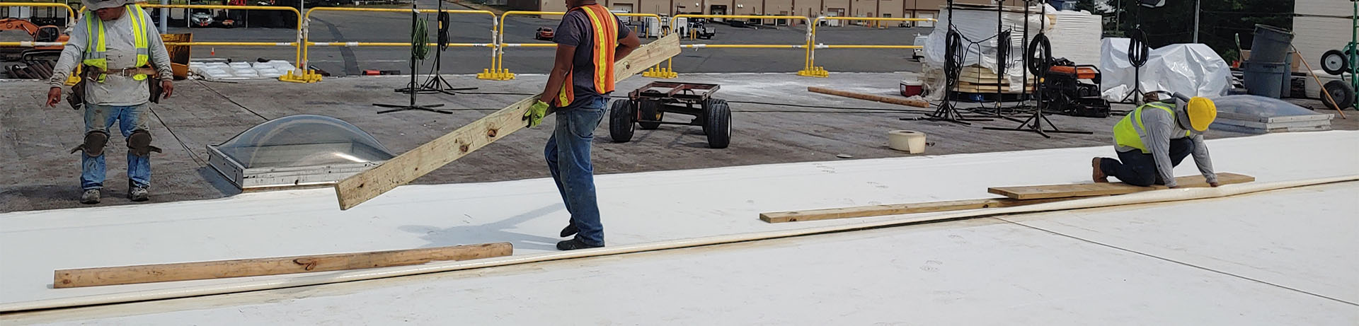 A Vanguard Roofing crew installing a new commercial roof in Poughkeepsie, NY.