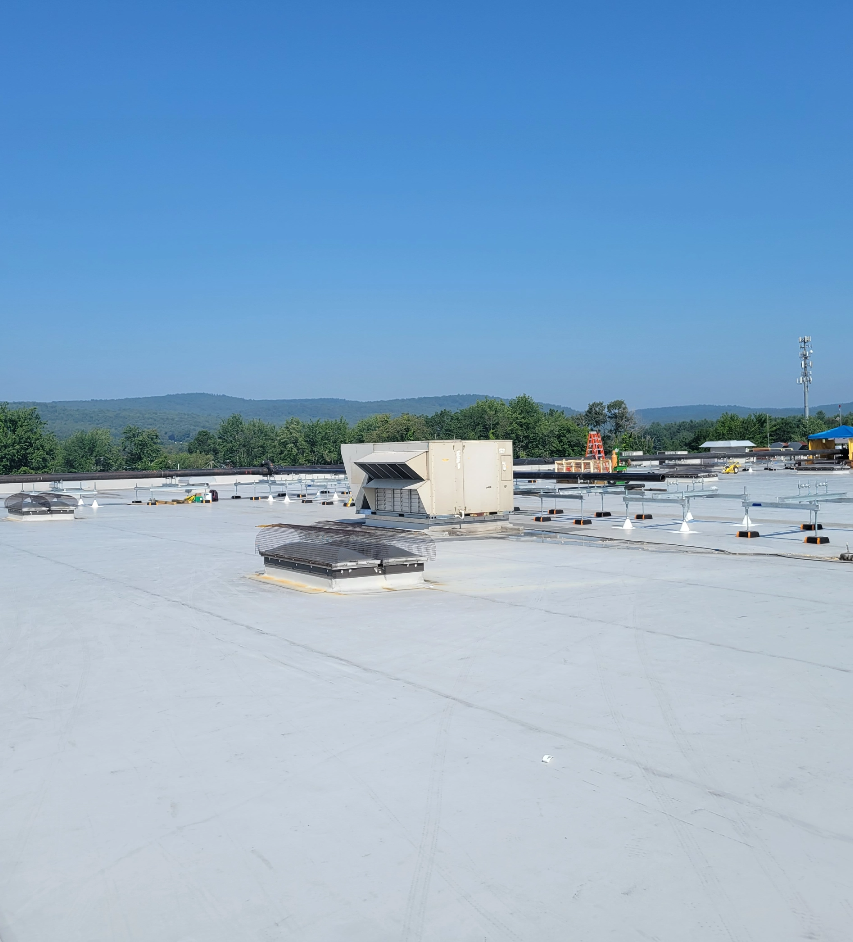 A flat commercial roof installed by Vanguard Roofing.