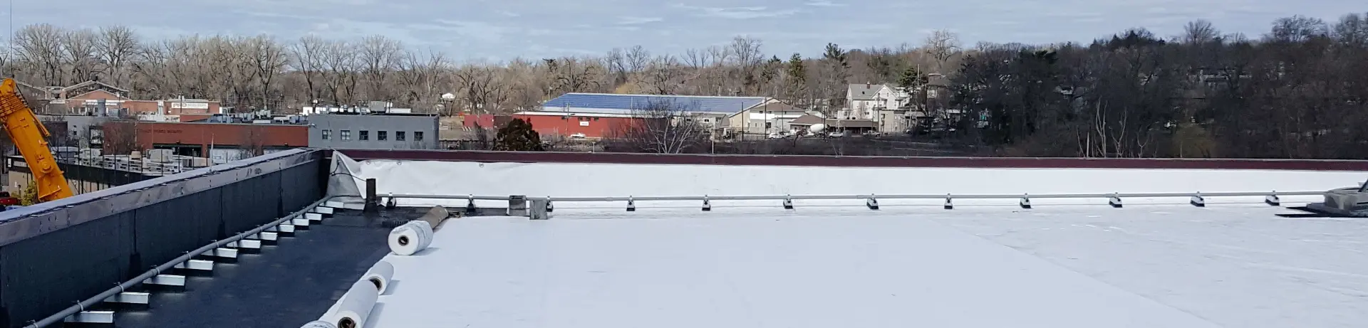 Rooftop view of a flat commercial roof installation.