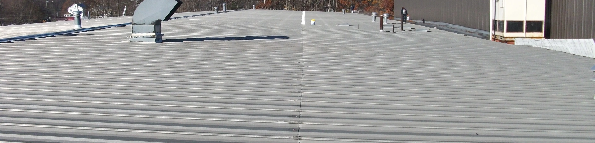 Rooftop view of a commercial metal roof installation in Pittsfield, MA.