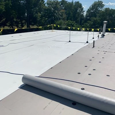 A roofing project in progress on a Salvation Army building.