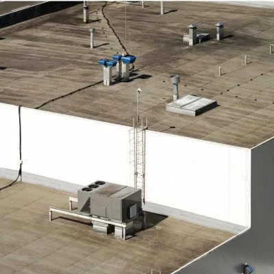 commercial flat roof with HVAC system and vents