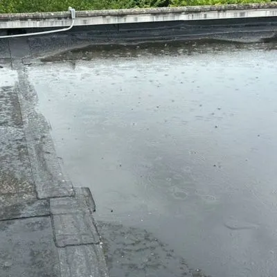 pooled rain on commercial flat roof